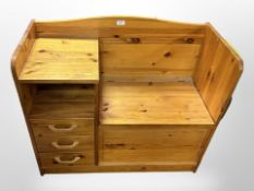 A pine storage telephone seat, 90cm wide x 40cm deep x 75cm high.