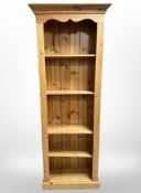 A contemporary pine open bookcase, 75cm wide x 29cm deep x 200cm high.
