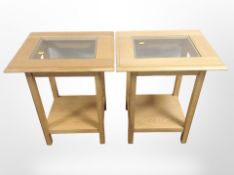A pair of Marks & Spencer oak-veneered lamp tables with glass inset tops,