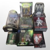 Eight Kenner Hasbro and Disney Store Star Wars figurines, boxed.