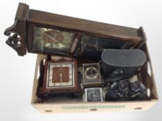 A group of wall and mantel clocks, pair of Miranda 10x50 binoculars.