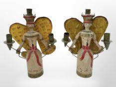 A pair of Nuremberg painted wood and metal folk art candelabra, height 33cm.