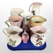 A collection of eight Maling pottery jugs.