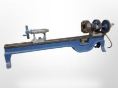A vintage Britannia Company cast-iron workshop lathe.