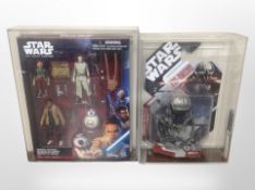 A Hasbro Disney Star Wars The Force Awakens figurine set in perspex box, graded 90 by Toygrader.