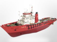 A scale model remote control boat marked 'BP Shell', length 140cm.