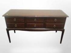 A Stag six-drawer chest, 131cm wide x 47cm deep x 72cm high.