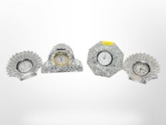 Four Waterford crystal quartz mantel timepieces, height 7cm.