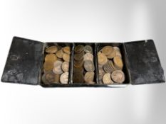 A lacquered tin of Victorian and Edwardian pennies.