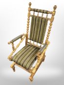 A Danish bobbin turned oak rocking chair.