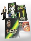 A group of Hasbro and Kenner Star Wars figurines,