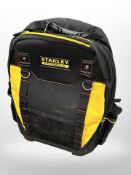 A Stanley Fatmax tool ruck sack containing some tools