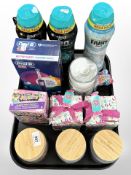 Three Wax Lyrical candles, Pacific Wax candle, three bottles of laundry scent booster,