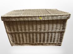 A wicker hamper, width 82cm.