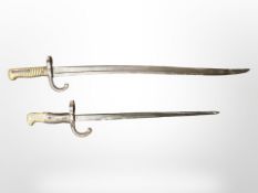 A French model 1866 Chassepot sword bayonet, together with a further French Lebel bayonet,