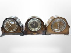 Three oak Art Deco mantel clocks.
