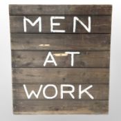A painted pine 'Men at Work' sign, width 68cm.