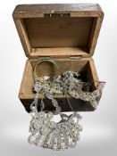 An oak box of assorted costume jewellery, malachite bangle, etc.
