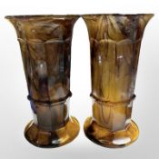 A pair of Davidson amber glass vases, height 25cm.