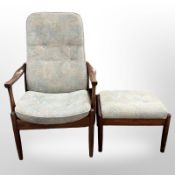 A Danish stained beech armchair with matching footstool.