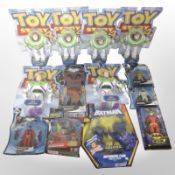 13 Mattel and Hasbro figurines including Toy Story, Batman, Spider-Man, etc.
