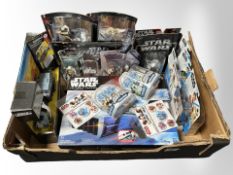 A quantity of Hasbro and Disney Store Star Wars figurines and other collectibles, boxed.