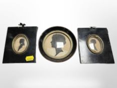Three early-19th century silhouette portraits.