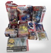 10 Hasbro Transformers figurines, boxed.