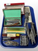 A collection of fountain and ballpoint pens and other writing utensils, letter knives, etc.
