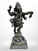 A late-19th/early-20th century Indian silvered brass figure of Ganesh, height 27cm.