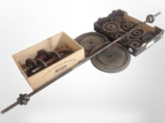 A barbell and a quantity of Weider cast-iron weights, and two dumbbells.