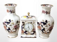 A Mason's Mandalay quartz mantle timepiece, and a pair of vases with octagonal rims, height 25cm.