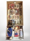 A quantity of Lledo and Matchbox die-cast vehicles, together with a collection of dolls.