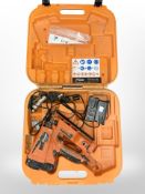 A Paslode Impulse IM65A F16 lightning nail gun with charger