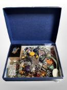 A box of assorted costume jewellery.