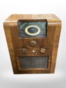 An Invicta walnut-cased valve radio, width 35cm.