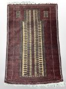A Balouch prayer rug, Afghanistan, 150cm x 94cm.