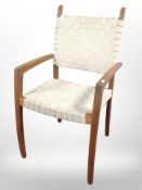 A 20th-century Danish teak-framed and canvas armchair, width 53cm.