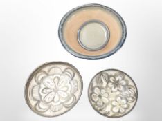 A group of large earthenware bowls and plates, largest 52cm diameter.