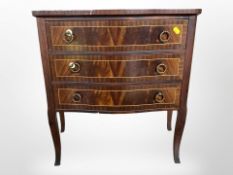 A reproduction mahogany and pine serpentine-front low chest, 64cm wide x 31cm deep x 62cm high.