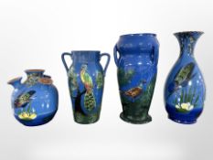 Four pieces of Torquay Pottery, tallest 24cm.