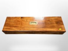 An early-20th century mahogany box with fitted baize-lined interior, 79cm wide.