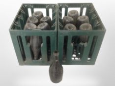 Two plastic bottle crates containing bottles.
