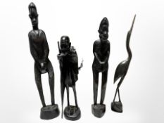 Four African wood/horn carvings,