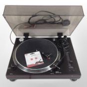 A Quartz direct drive turntable.