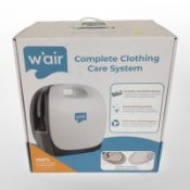 A boxed W'air complete clothing care system.