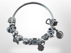 A Pandora silver charm bangle CONDITION REPORT: 45.