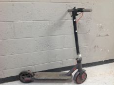 An Aovopro electric scooter.