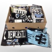 A collection of 1990s and later Newcastle United matchday programmes, scarves, poster,