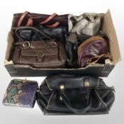 A group of ladies quality leather handbags and purses,